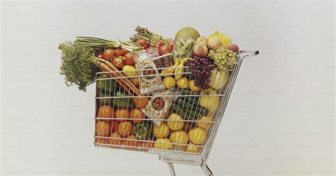 A shopping cart full of assorted fruits and vegetables photo – Abundance Image on Unsplash