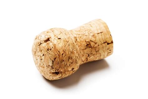 Premium Photo | Champagne cork on white