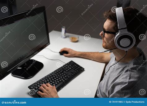 Close Up Of Man Playing Computer Video Game Stock Image - Image: 70191985