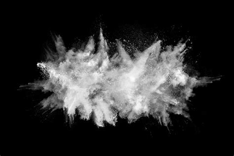 Premium Photo | White powder explosion on black.