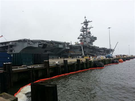 Two photos of the USS George W Bush (CVN-77) before it leaves on ...