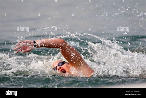 Natalie du Toit of South Africa, swims during the women's marathon ...