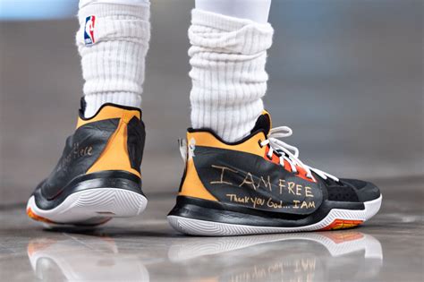 Kyrie Irving Covers Nike Logo On Sneakers With 'I Am Free'