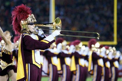 a marching band is performing on the field