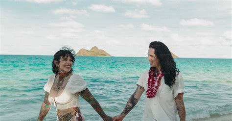 Two women holding hands while walking on the beach photo – Woman Image ...