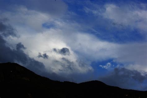 Dramatic clouds over the mountains free image download