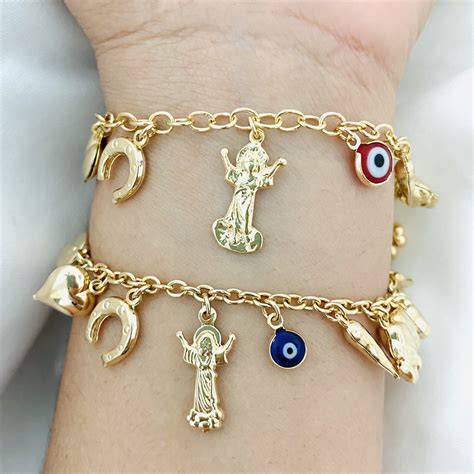 Discover 53+ gold lucky charm bracelet - Billwildforcongress