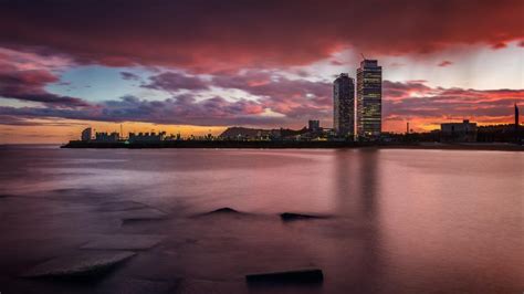 Barcelona skyline at sunset - backiee