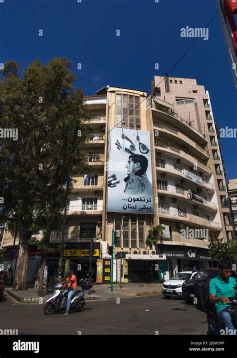 Old lebanese heritage building with a Kataeb Party billboard, Beirut Governorate, Beirut ...