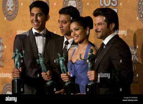 Slumdog millionaire cast hi-res stock photography and images - Alamy