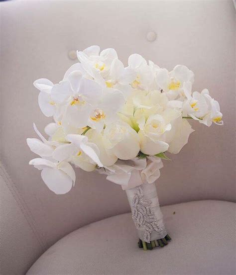 White Orchid bouquet #weddingreception #wedding… | Orchid bouquet ...