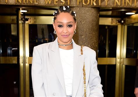 Tia Mowry Wore An All-Gray Outfit Accessorized With Hair Shells—See ...