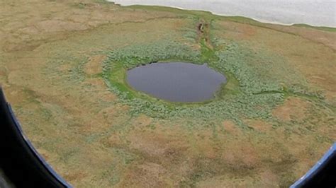 Mysterious giant hole in Siberia gradually filling up with water, expanding (PHOTOS) — RT News