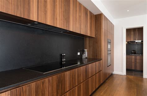 stunning walnut and black kitchen | Neo Design | Modern black kitchen ...