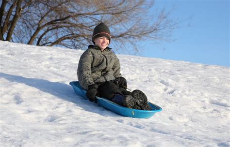 Sledding fun stock photo. Image of recreation, cold, hill - 12495552