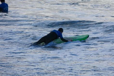 young athletes practising the water sport of surfing 21544299 Stock ...