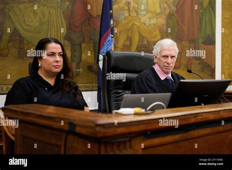 Principal Law Clerk Allison Greenfield, left, and Judge Arthur Engoron, sit on the bench inside ...