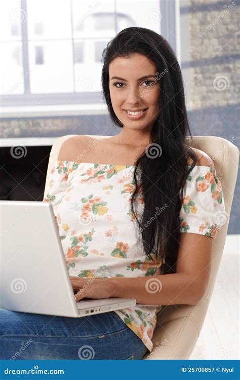 Beautiful Young Woman with Laptop Smiling Stock Image - Image of computer, casual: 25700857