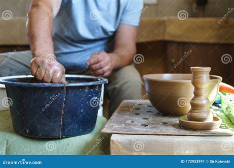 Male hands at pottery work stock image. Image of pottery - 172953991