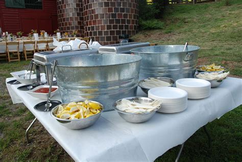 Put the low country boil in the metal tubs and have the difference sauces around, also serve ...