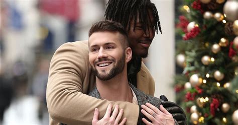 NFL Player Ryan Russell and Boyfriend Corey O'Brien Share PDA During ...