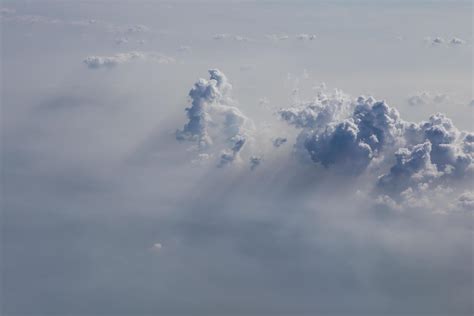 clouds and blue sky seen from plane 9637147 Stock Photo at Vecteezy