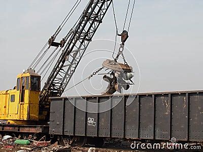 Scrap Yard Crane With Magnet Stock Photography - Image: 13277362