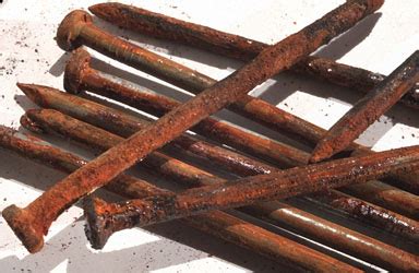 Painet Licensed Rights stock photo of rusty iron nails showing orange oxide rust oxidation oxygen