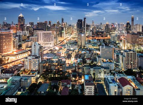 Bangkok city skyline at night - Skytrain train line & main tourist area ...