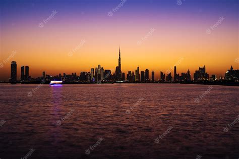 Premium Photo | Night view of Dubai Skyline buildings. A shot of Dubai Skyscrapers a view from ...