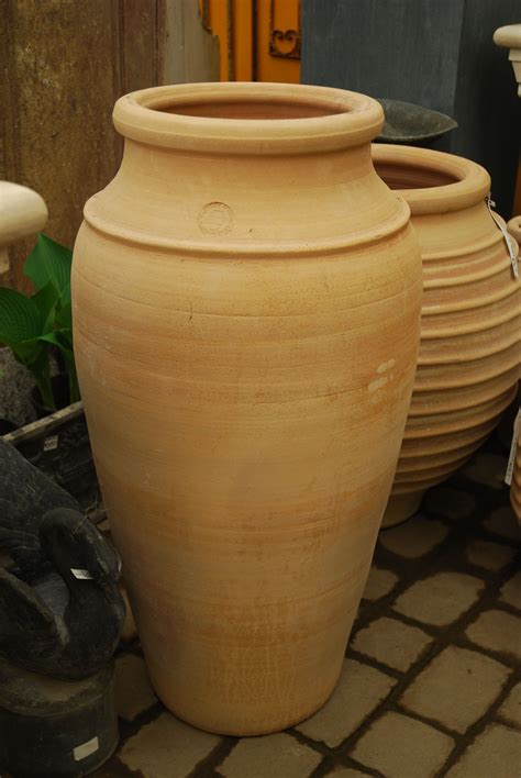 We have a variety of Greek terracotta pots. This tall elegant pot one ribbed pot is perfect for ...