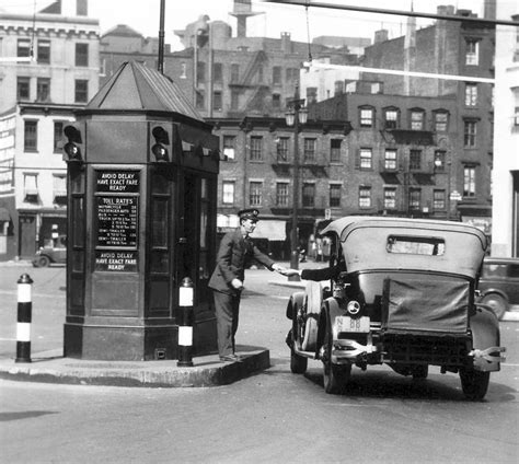 A toll booth at the Manhattan entrance to the... - New York: The Golden Age