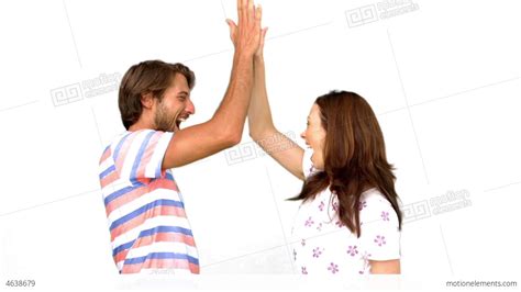 Friends Giving High Five On White Background Stock video footage | 4638679