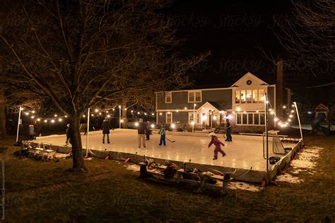 "Family Together Cold Winter Lifestyle Home Backyard Ice Skating Rink ...