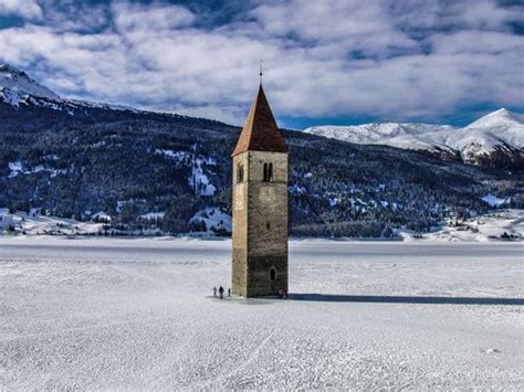 Frozen Bell tower, Lake Reschen | Italy (by Christian... | Places to visit, Wonders of the world ...