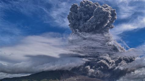 PHOTOS: Indonesia's Volcano Mount Sinabung Erupts, Spewing Ash Miles ...