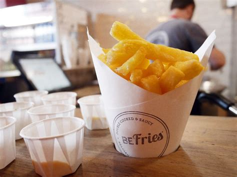 a cone of fries at BeFries in Brighton | Belgian fries, Brighton, Gastro