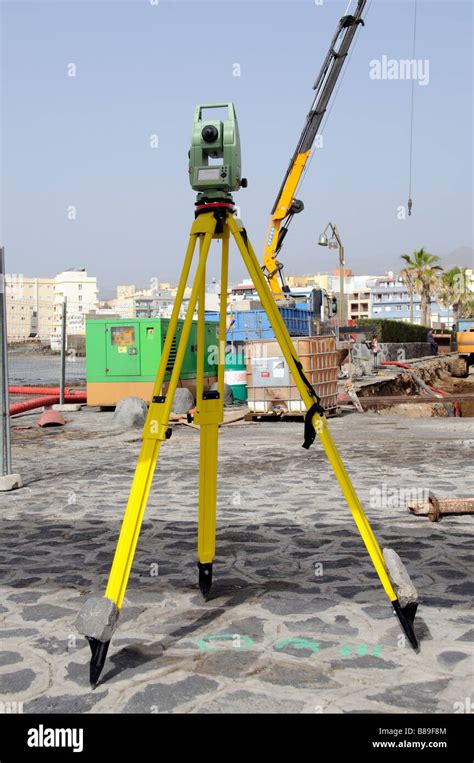 Theodolite optical surveying equipment on tripod Stock Photo - Alamy