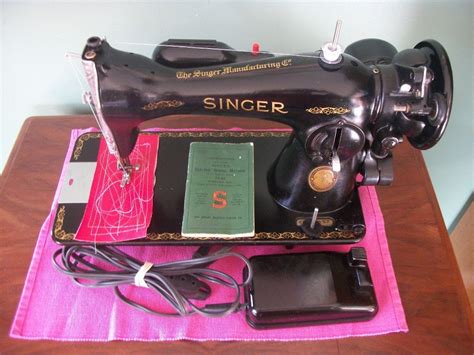 Singer 15-91 potted motor sewing machine with manual scroll