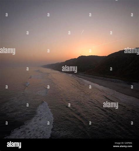 Aerial sunset on the beach Stock Photo - Alamy