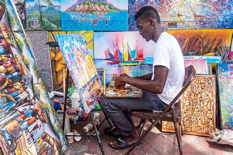 Painter in Port-au-Prince, Haiti Uses His Own Style