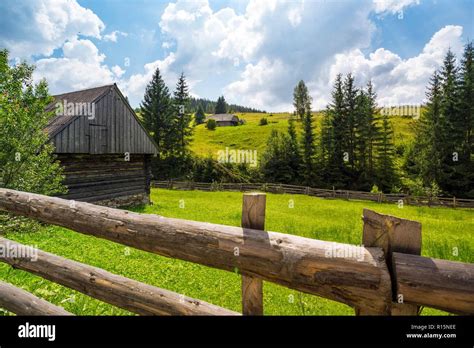 Ukrainian landscape. view of the wooden houses and mountains in ...