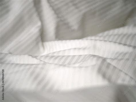 Hotel bed white sheets detail Stock Photo | Adobe Stock