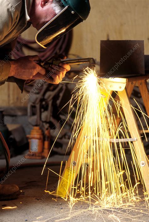 An Acetylene Torch Cutting Steel - Stock Image - T730/0181 - Science Photo Library