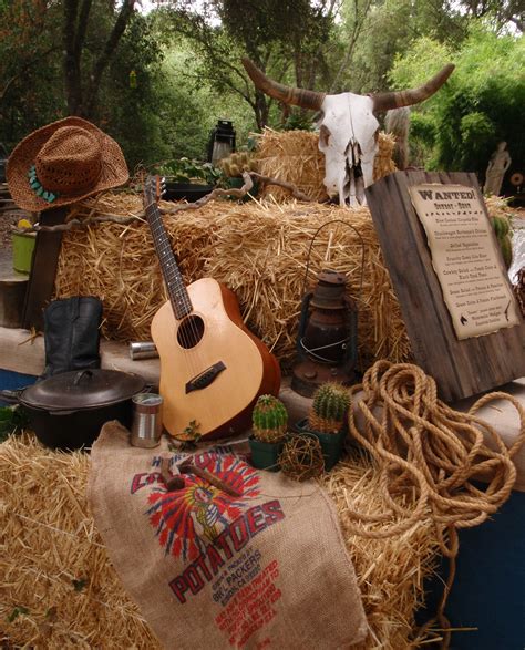 Western Theme must haves: Guitar, cowboy hats, rope, sacks, hay bales ...