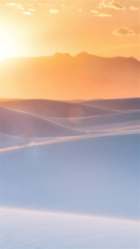 Sunrise over the white desert dune - backiee