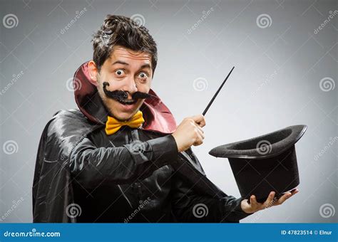 Funny Magician With Wand Royalty-Free Stock Photography | CartoonDealer ...