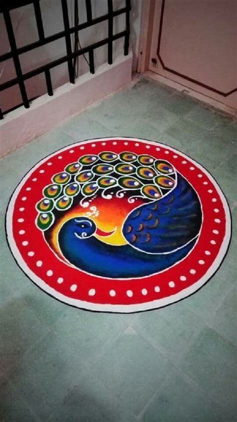 Gorgeous Peacock Circle Rangoli - Blue, Red, White | Simple rangoli designs images, Big rangoli ...