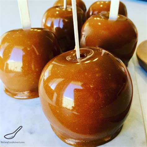 I have great childhood memories eating these delicious Caramel Apples on a stick, usually at a ...