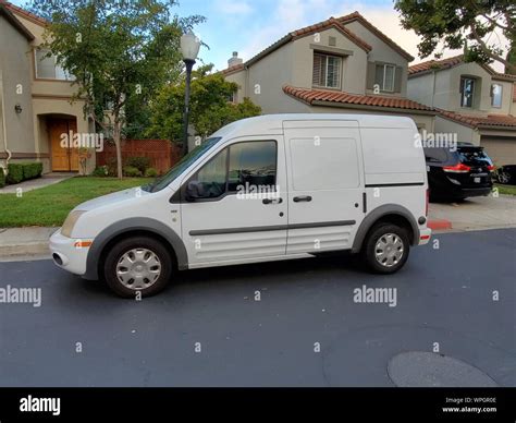 Side view of white Ford Transit Connect van in San Ramon, California ...